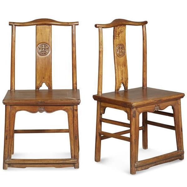 A front and angled view of a pair of Chinese Yoke-Back chairs